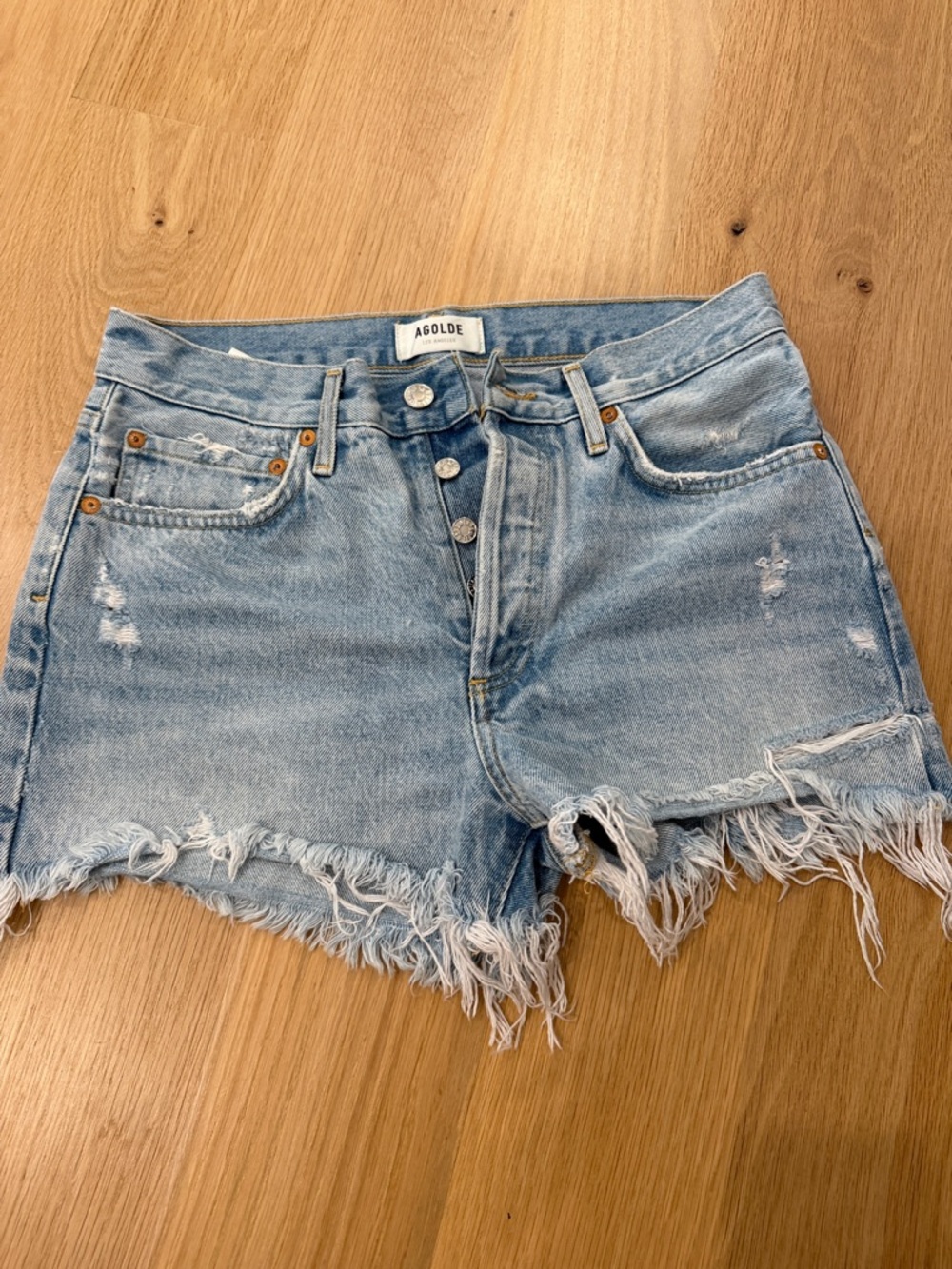 Agolde Light Wash Distressed Denim Cutoff Shorts